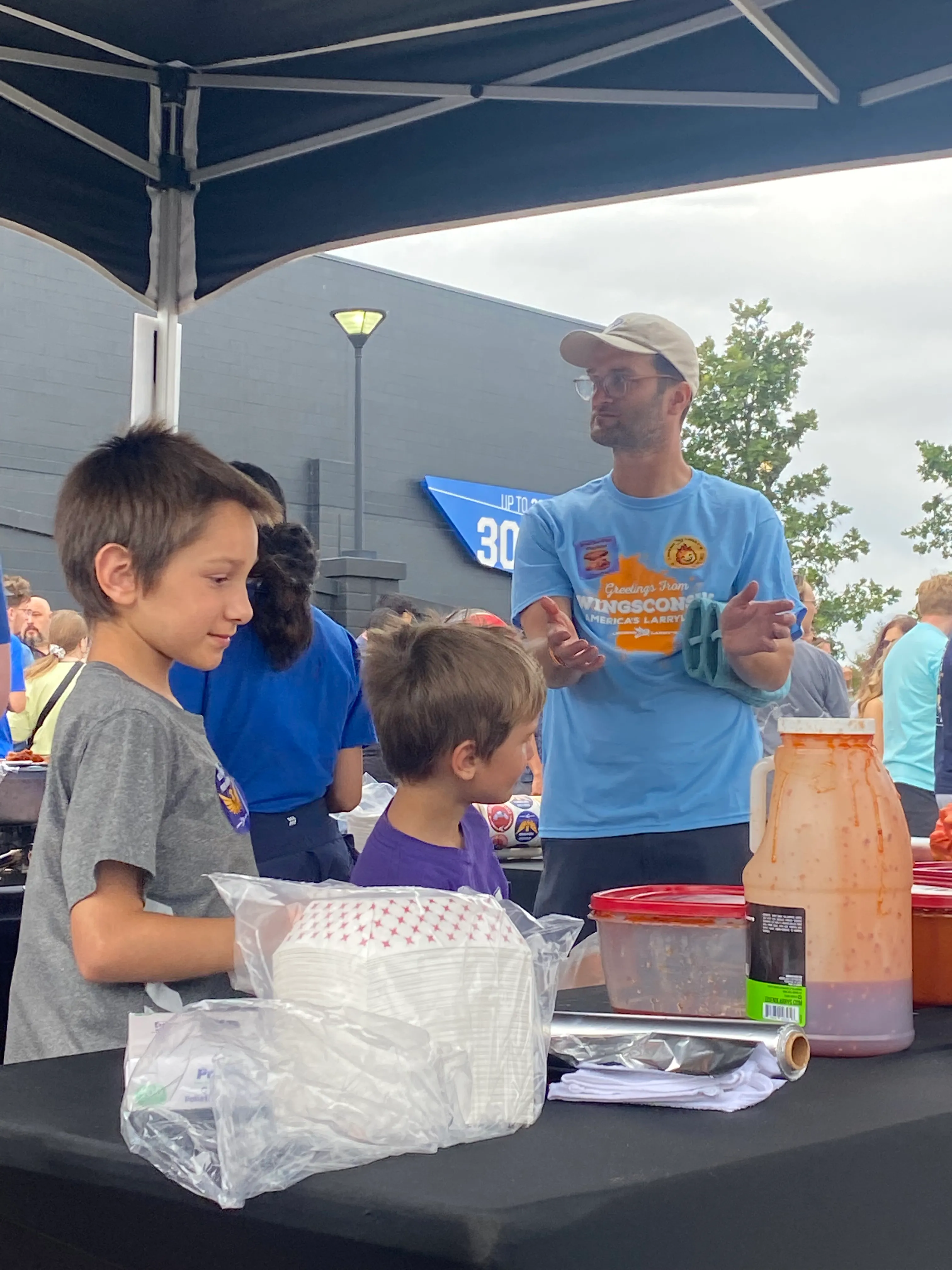 Dane and sons at the National Buffalo Wing Festival, 2023